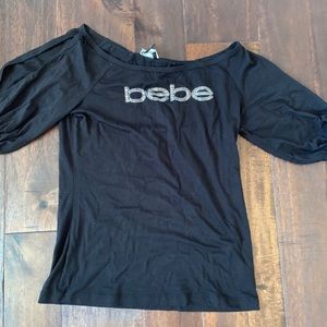 Bebe shirt with shoulder split